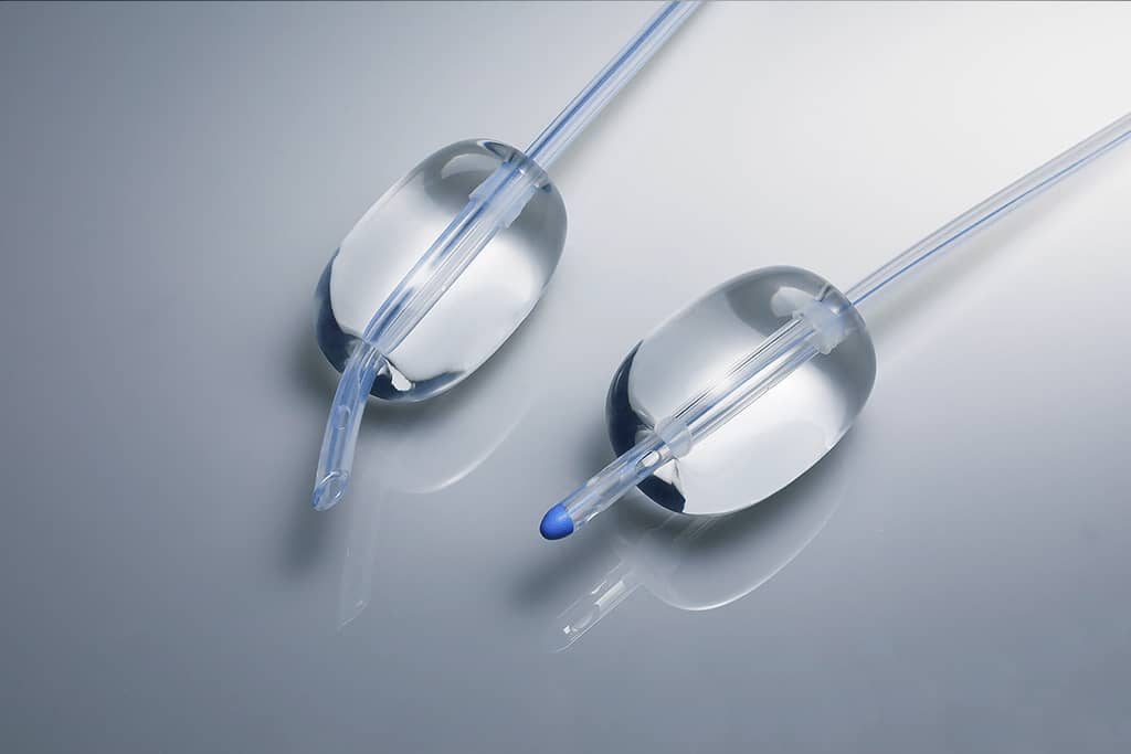Sonde urinaire siliconée à trois (03) voies bout béquillé